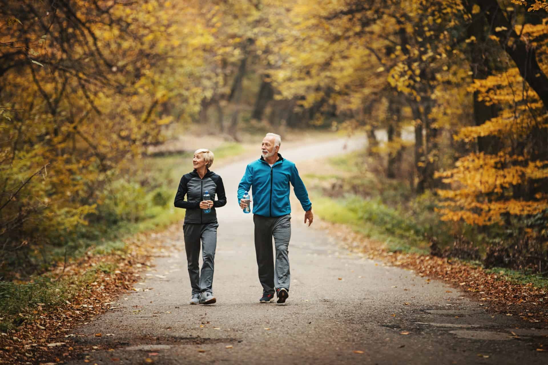 Senior couple power walking