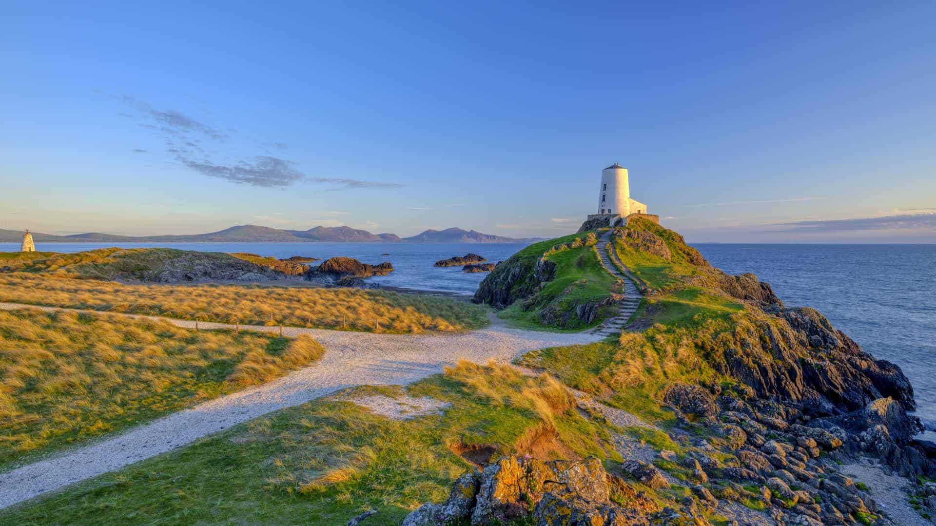 Twr Mar Lighthouse on Llanddwyn Island off Anglesey, Wales UK